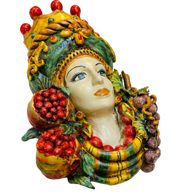 Pair of wall hanging Moor's heads, Caltagirone, with crown and fruit, verdigris background, opaque enamel, height about 