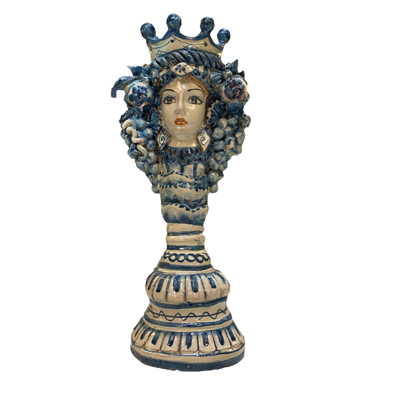 Cabeça Janus de duas faces com castiçal de cerâmica Caltagirone de duas faces, fundo azul antigo - 