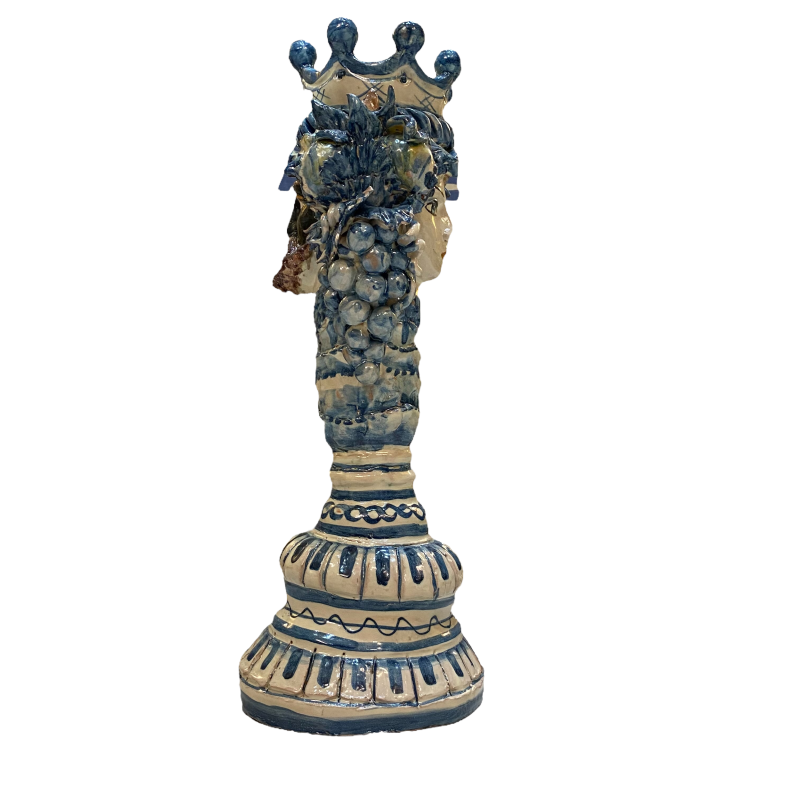 Two-faced Janus head with two faces Caltagirone ceramic candlestick, antique blue background - 