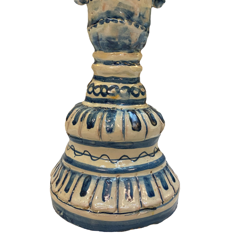 Two-faced Janus head with two faces Caltagirone ceramic candlestick, antique blue background - 