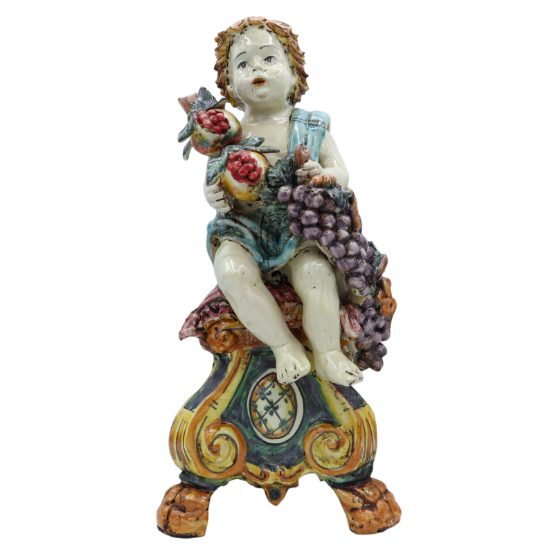 Putto with Grapes and Pomegranate on Baroque base, antique opaque enamel - Caltagirone - Height approx. 33cm SCR mod - 