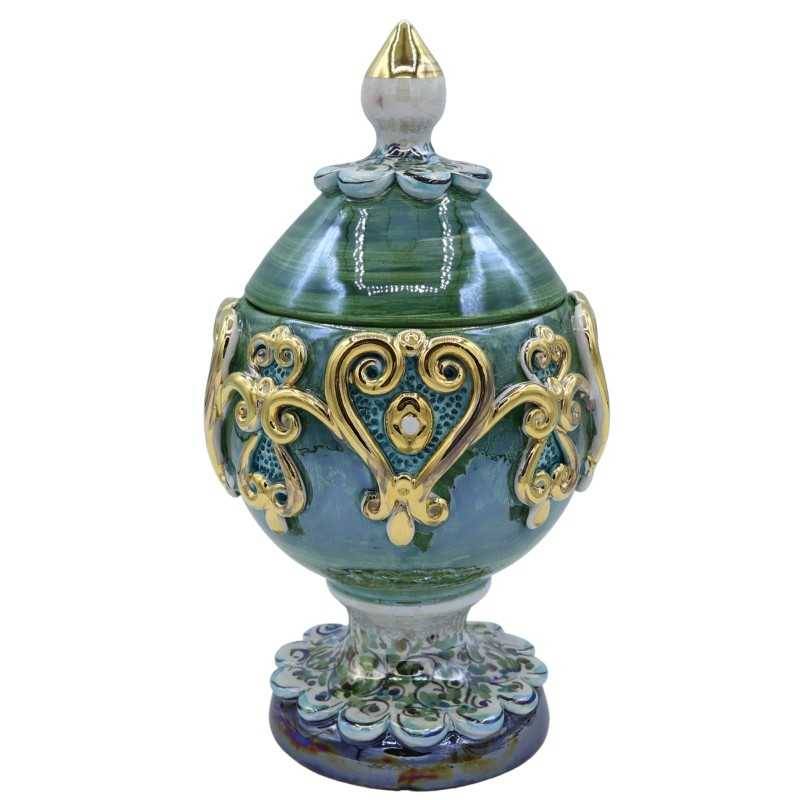 Egg in Caltagirone ceramic in Fabergè style with reliefs in 24k pure gold enamel, green background, height approx. 23cm.