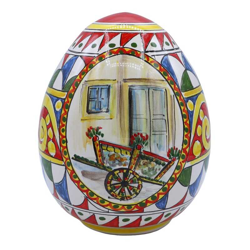 Caltagirone ceramic egg, Sicilian cart style decoration with miniature, red and yellow background, height approx. 20 cm.