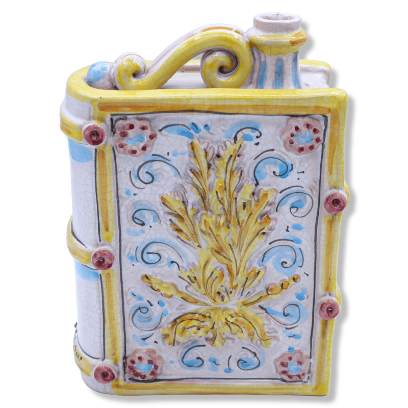 Botella libro en cerámica Caltagirone, relieve y decoración barroca con efecto Craquelé, h 20 cm x ancho 15 cm aprox. MO