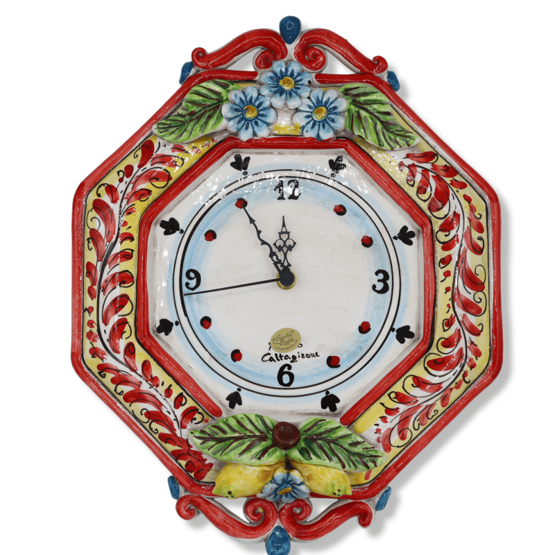 Caltagirone ceramic clock, 17th century decoration flowers and lemons in relief on a red background, h35 cm approx. RP m