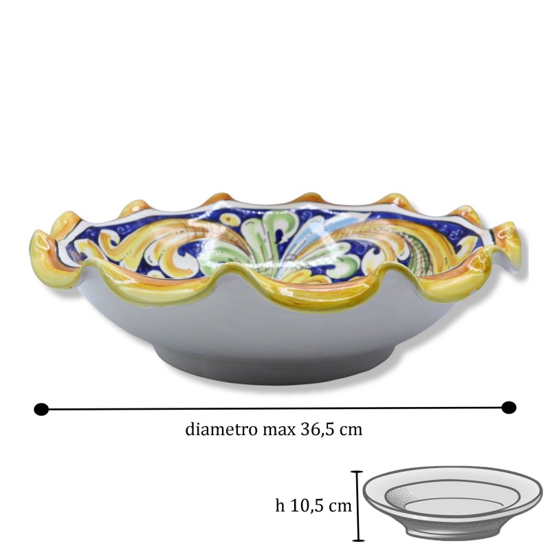 Centro de mesa de cerámica Caltagirone, festoneado y decorado con motivo barroco sobre fondo azul, Ø 35 cm aprox. Modelo