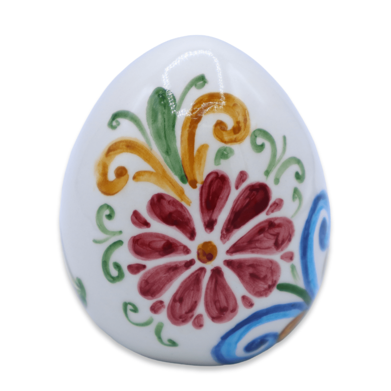 Ovo de cerâmica Caltagirone, decoração floral sobre fundo branco h 9 cm aprox. mod FL - 