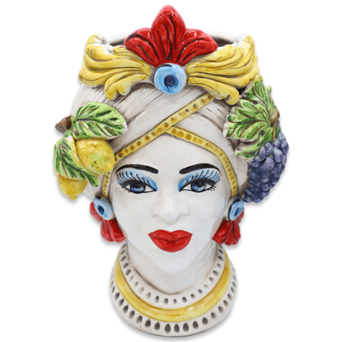 Tête de Maure de Caltagirone avec frise et applications de citrons et de raisins, environ 28 cm de haut. (1 pc)