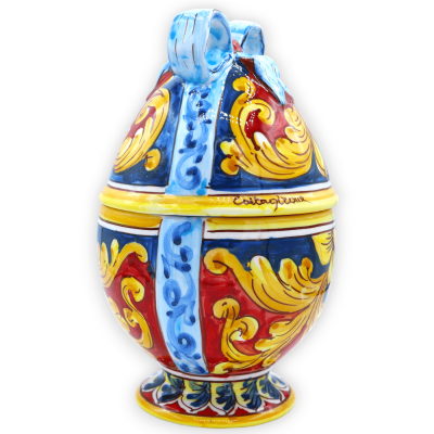 Jewelery egg with ribbon in Caltagirone ceramic, Baroque decoration with red and blue background, h 27 cm approx. CAN mo