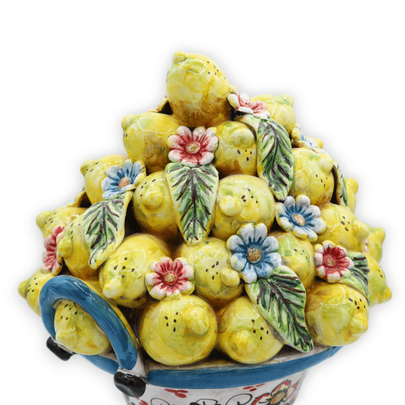 Cesto central de cerâmica Caltagirone, com aproximadamente 30 cm de altura. azul com aplicações de limões, flores e folh
