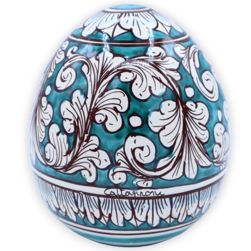 Caltagirone keramisch ei, witte barokke decoratie op kopergroen achtergrond, h 15 cm en Ø 13 cm ca. Mod TD - 