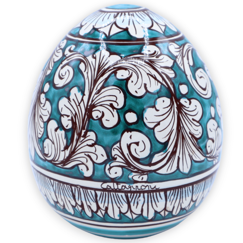 Caltagirone ceramic egg, white baroque decoration on verdigris background, h 15 cm and Ø 13 cm approx. Mod. TD - 