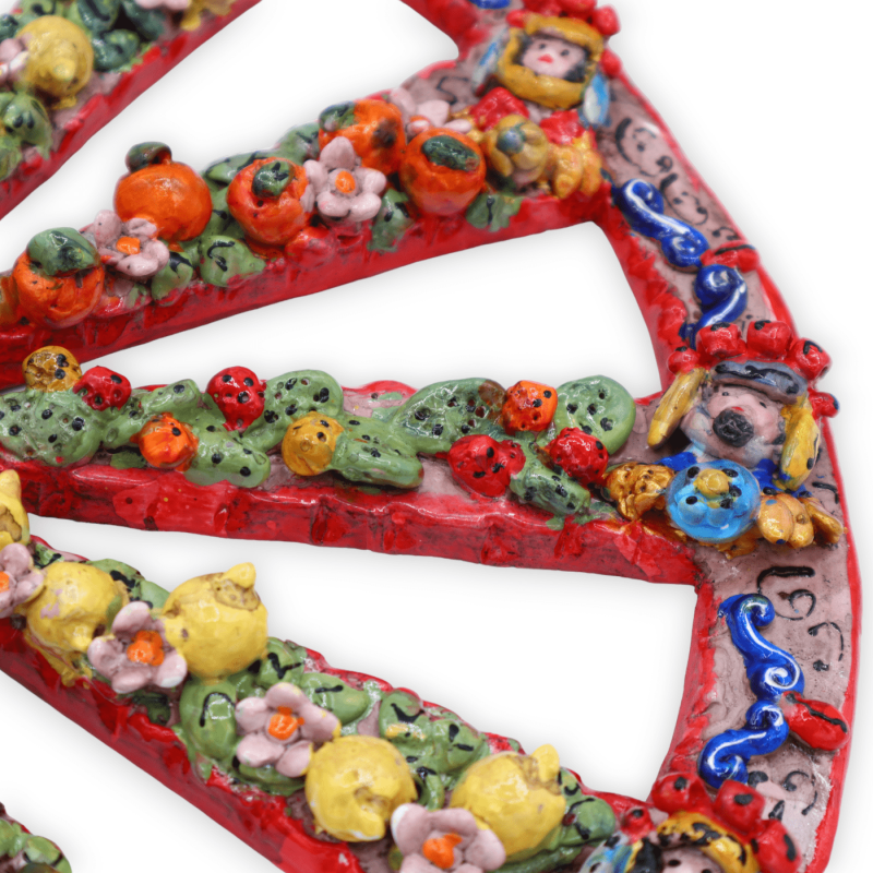 Sicilian cart wheel in fine ceramic, with applications of fruit and flowers on a red background, Ø 37 cm approx. - 