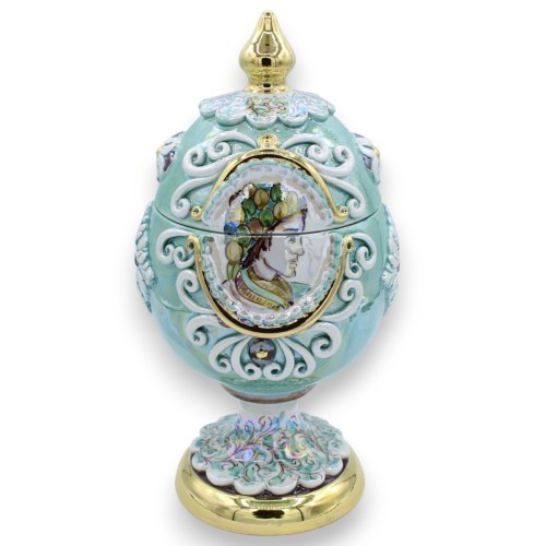 Egg in Caltagirone ceramic in Fabergè style, h30 cm approx. - with reliefs in 24k pure gold enamel and miniatures, coppe