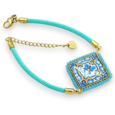 Pulseira com azulejo de pedra de lava turquesa e cordão de tecido água-marinha - C 25cm aprox. Fecho de aço - 