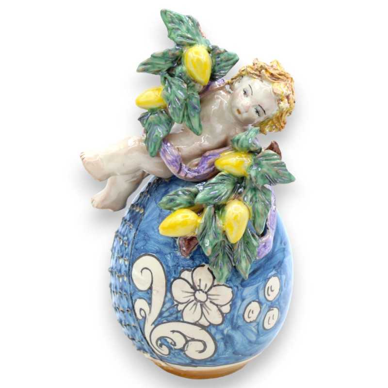 Putto with fruit on Egg in Caltagirone ceramic opaque glaze - height 20 cm - 