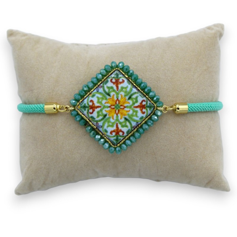 Pulseira com azulejo de pedra de lava verde, cordão têxtil, L aprox. 25cm cristais verdes, fecho de aço - 