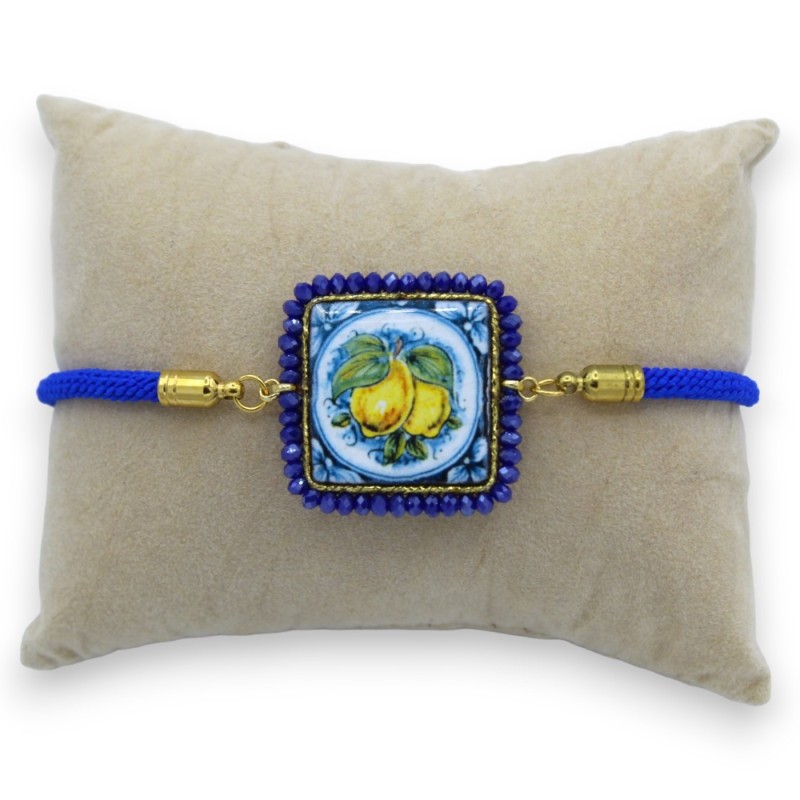 Pulseira com azulejo de pedra de lava azul, cordão têxtil, L aprox. 22cm cristais azuis, fecho de aço - 