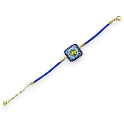 Armband med blå lavastenskakel, textilsnöre, L ca 22cm blå kristaller, stållås - 
