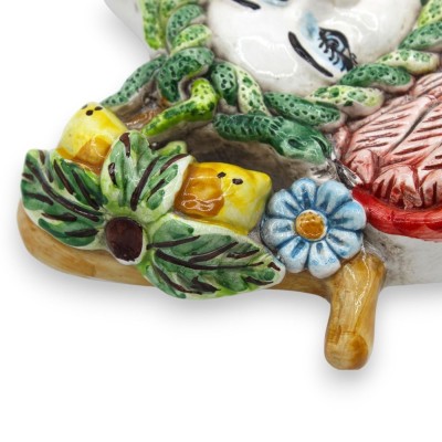 Trinacria ceramica Caltagirone - h 25 cm x 22 cm ca. decoro limoni e floreale, ali rosse - 