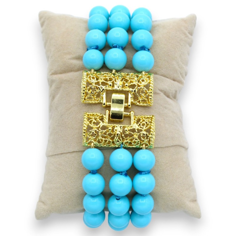 Bracelet avec trois rangs de véritables pierres en Pâte de Turquoise et Camée central - L 20 cm env. - Arrêt en laiton -