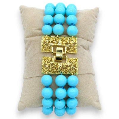 Bracelet avec trois rangs de véritables pierres en Pâte de Turquoise et Camée central - L 20 cm env. - Arrêt en laiton -