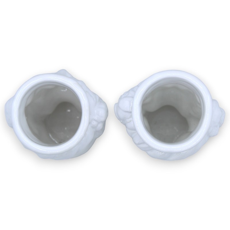 Ett par morhuvuden i Caltagirone keramik - h cm 10 / 11 cm ca. Blank vit - 