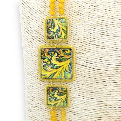 Collana con doppio filo di pietra occhio di gatto h 70 cm ca. Tris di Piastrelle in pietra lavica con cristalli e maioli