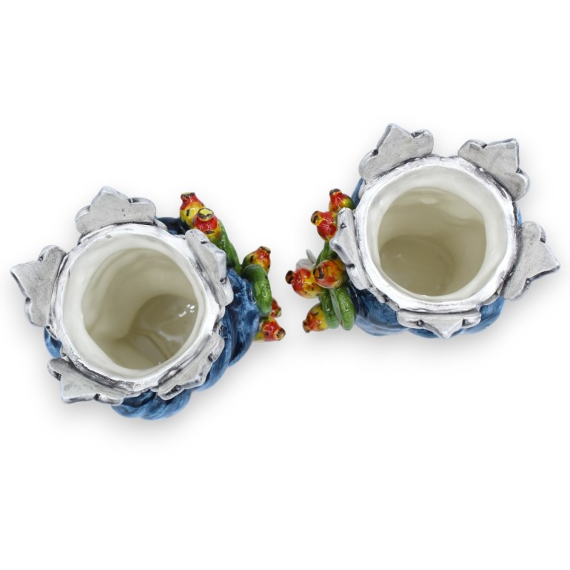 Ett par morhuvuden i fin keramik med krona och turban - h ca 16 cm. med appliceringar av MD3-prickly pear - 