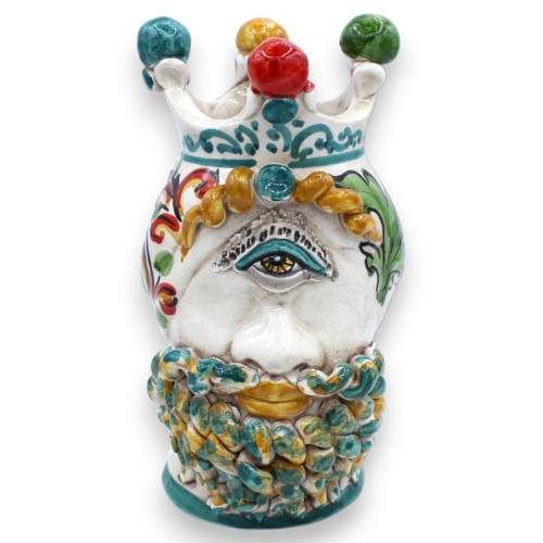 Head of Polyphemus, mythological figure in Caltagirone ceramic, h approx. 20 cm. Green and orange beard on white backgro