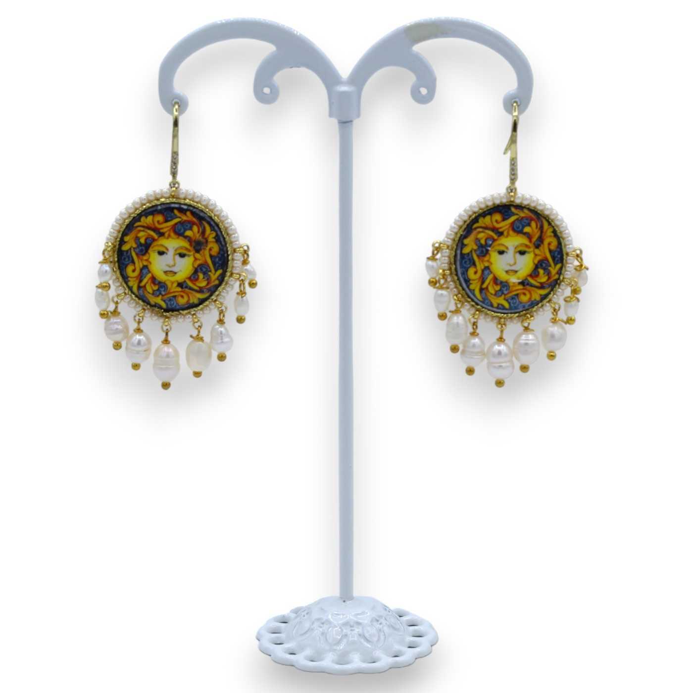 Teardrop Tiger's Eye earrings in silver bezel setting with moonstone b