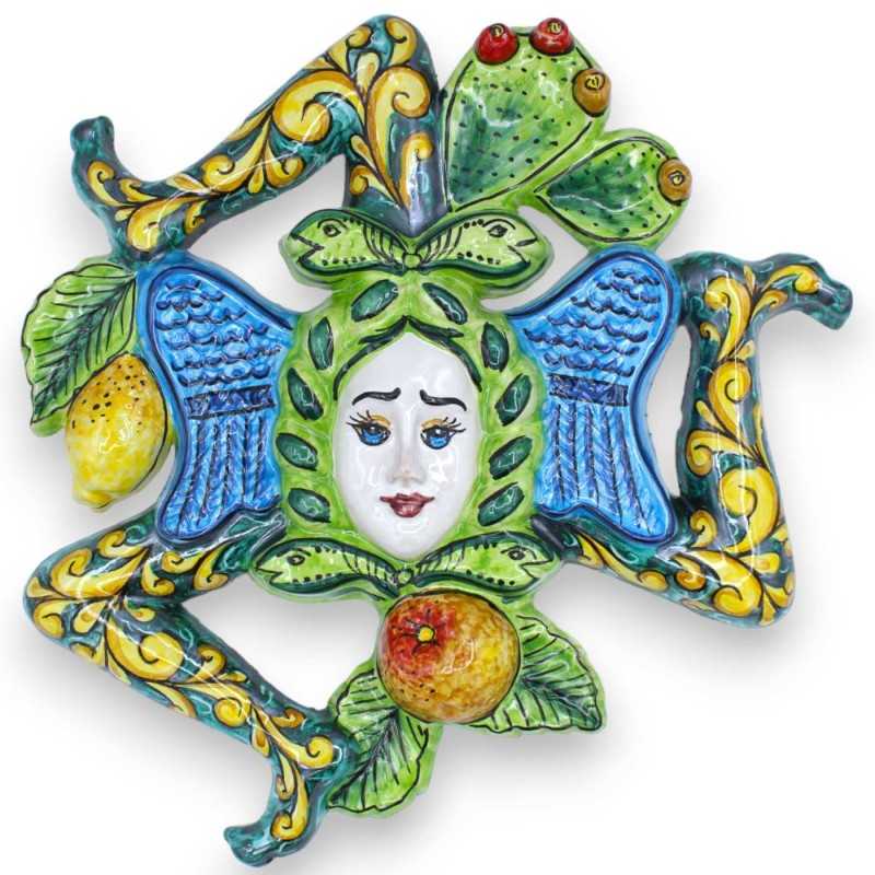 Trinacria em cerâmica siciliana - h 30 x 30 cm aprox. fundo verde, decoração de frutas e lâminas de figos da Índia - 
