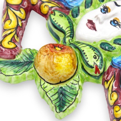 Trinacria in Sicilian ceramic - h 30 x 30 cm approx. Bordeaux background, fruit decoration and prickly pear blades - 