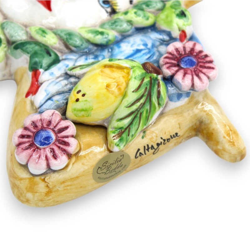Trinacria ceramica Caltagirone - h 25 x 22 cm ca. decoro limoni e floreale, ali blu - 