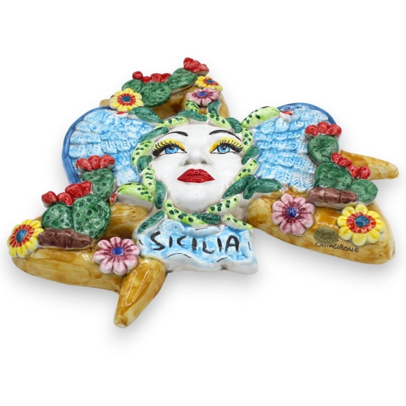 Trinacria in ceramica Caltagirone - h 36 cm ca. con applicazioni di Pale ficodindia e fiori - 