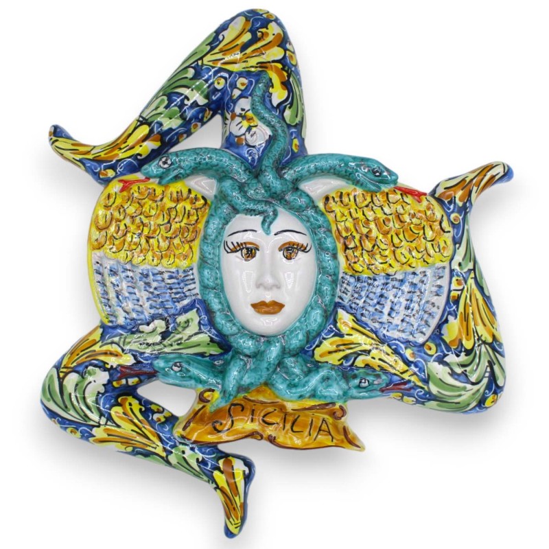 Trinacria em cerâmica Caltagirone, h aproximadamente 40 cm. fundo azul com decoração barroca verde e amarela - 