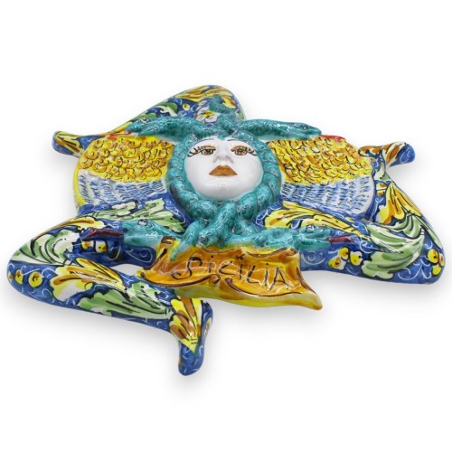 Trinacria de cerámica de Caltagirone, altura aprox.40 cm. fondo azul con decoración barroca verde y amarilla -  2