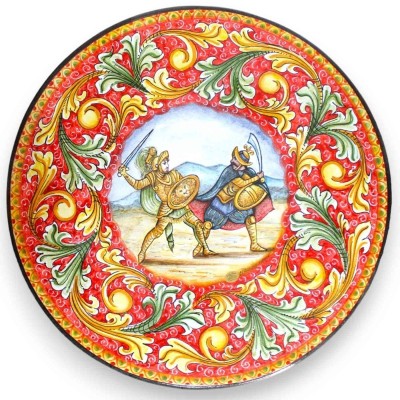 Runder Tisch aus Lavastein inklusive schmiedeeiserner Struktur, Ø ca. 60 cm. Barocke Dekoration mit Paladin-Kampfszene -