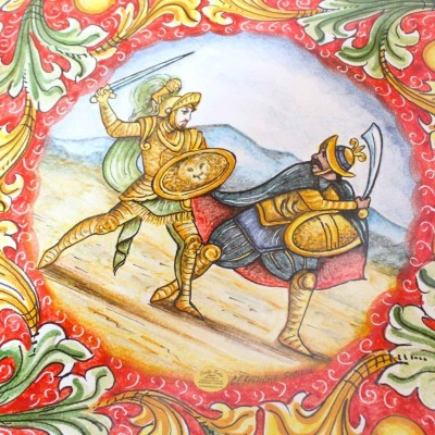Runder Tisch aus Lavastein inklusive schmiedeeiserner Struktur, Ø ca. 60 cm. Barocke Dekoration mit Paladin-Kampfszene -