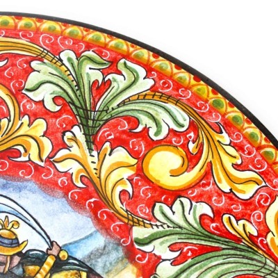 Runder Tisch aus Lavastein inklusive schmiedeeiserner Struktur, Ø ca. 60 cm. Barocke Dekoration mit Paladin-Kampfszene -