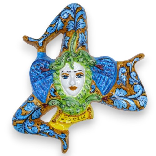 Trinacria in ceramica Siciliana - h 35 x 35 cm ca. decoro barocco blu su fondo Ocra - 