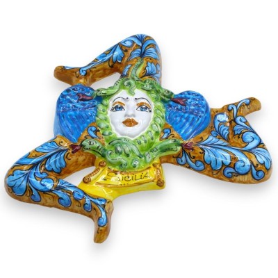 Trinacria de cerámica siciliana - h 35 x 35 cm aprox. decoración barroca azul sobre fondo ocre - 