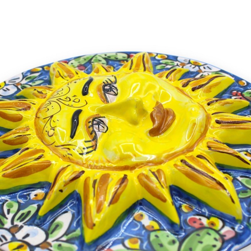 Sol de disco cerâmico Caltagirone, Ø aproximadamente 25 cm. decoração de pera espinhosa e flores em um fundo azul - 