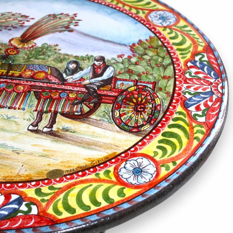 Okrągły stół z kamienia lawowego Etna Ø 60 cm, cokół z kutego żelaza, dekoracja sycylijskiego wózka w sycylijskim krajob