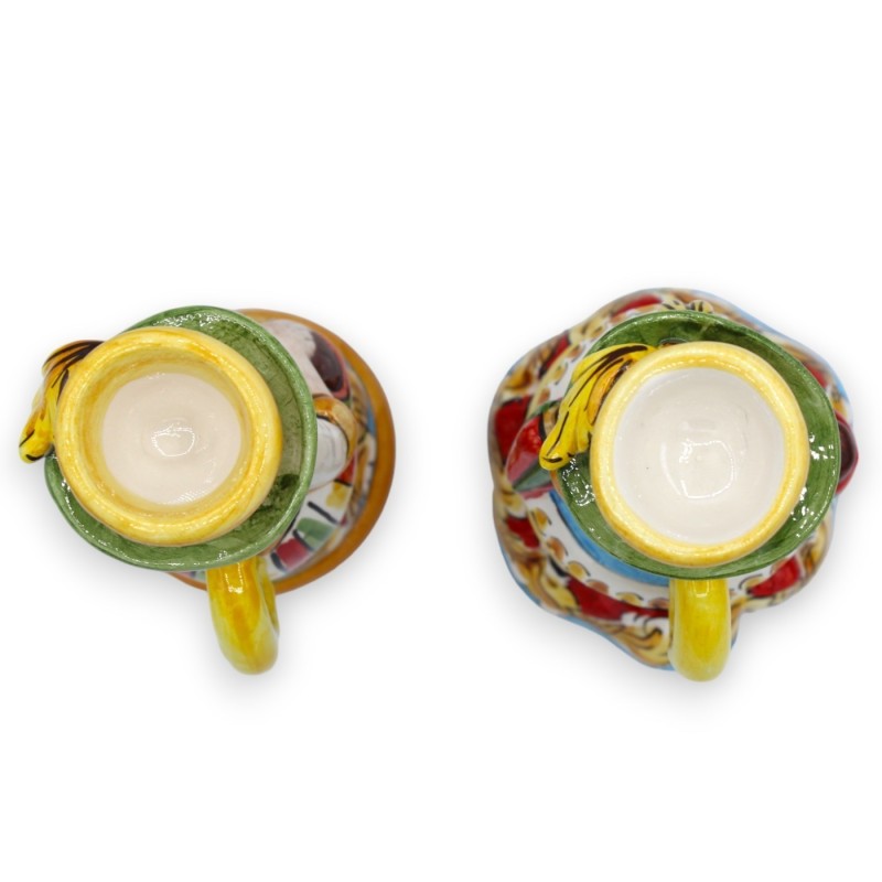 Ett par "Signorotti" lampor, i Caltagirone keramik, ca h 20 cm. barock och mångfärgad dekoration - 