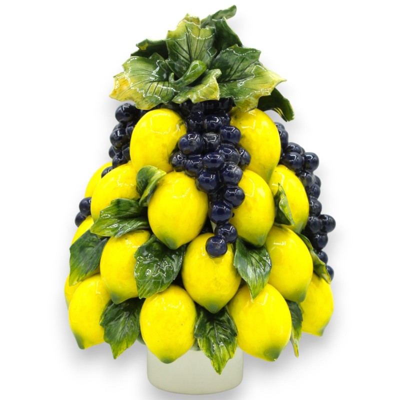 Support pyramide de citrons et raisins en céramique fine, d'environ 30 h et 20 cm de long. aux feuilles de vigne et de c