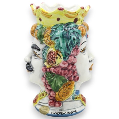 Tête de Janus Bifrons à deux visages, environ 18 cm de haut. Céramique de Caltagirone, décor de couronnes et de fruits m
