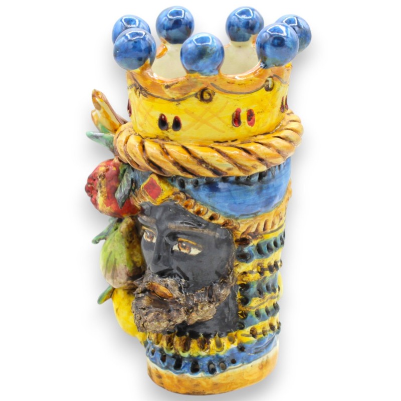 Cabeça de Janus Bifrons com duas faces em cerâmica de Caltagirone, altura 18 cm aprox. Coroa, trança e fruto, fundo azul