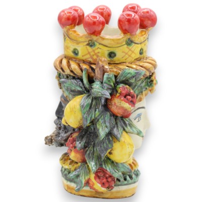 Janus Bifrons head with two faces in Caltagirone ceramic, h 18 cm approx. Crown, braid and fruit, green background - 