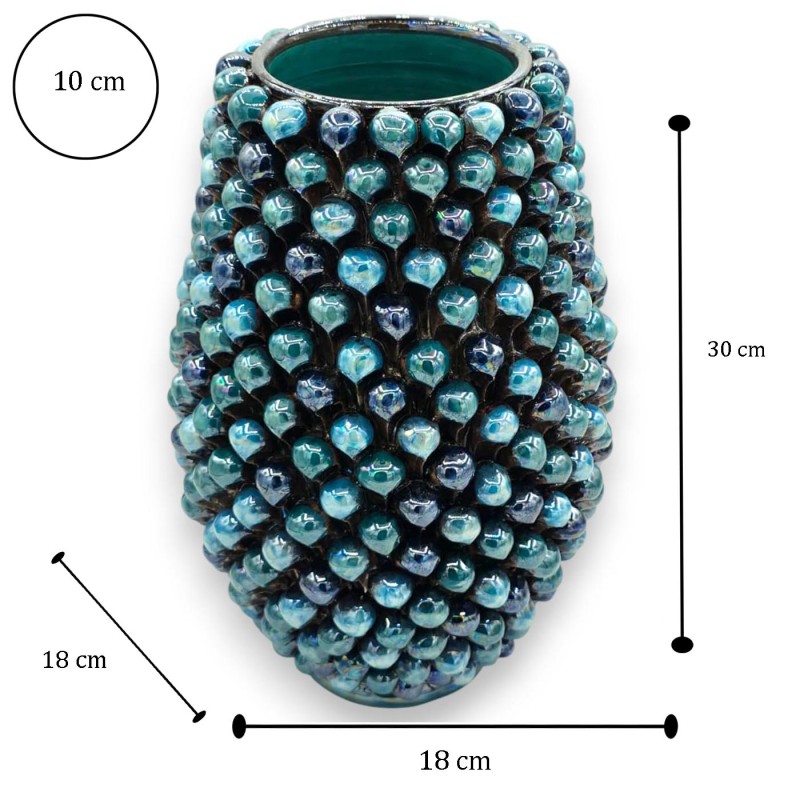 Vaso em forma de pinha, feito de...